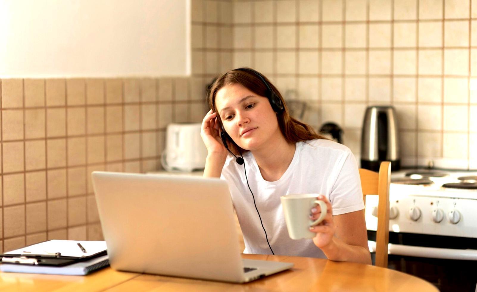 Diverse group of adults participating in financial literacy workshop with learning materials